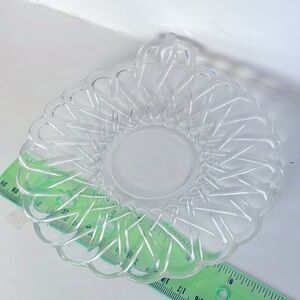 Indiana glass 6 inch cheese plate with single handle.